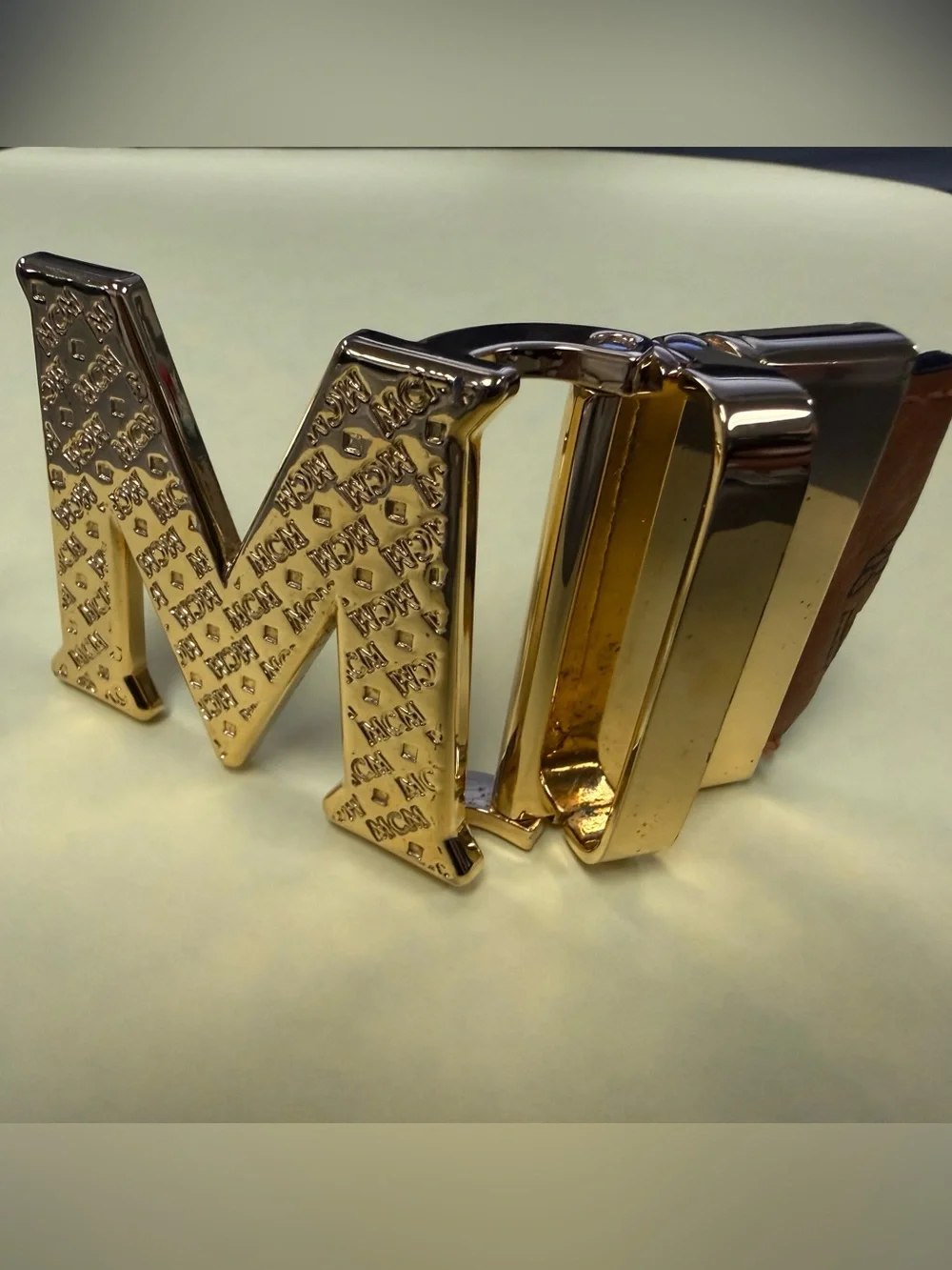 MCM Gold Tone Initial “M” Automatic Ratchet Belt Buckle Designer Logo